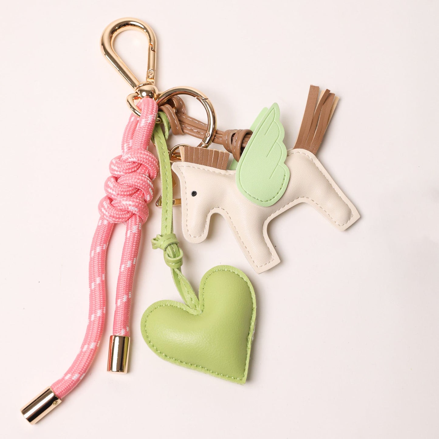 KEY CHAIN BARBIE WITH CHARMS - GREEN HEART AND WHITE FLYING HORSE