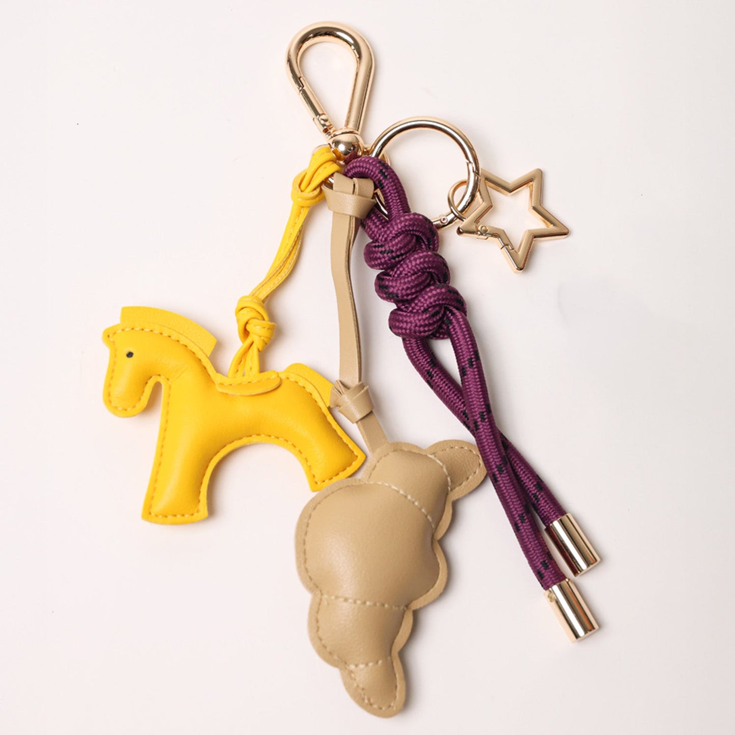 KEY CHAIN EGGPLANT WITH CHARMS - BEIGE CROISSANT AND YELLOW HORSE