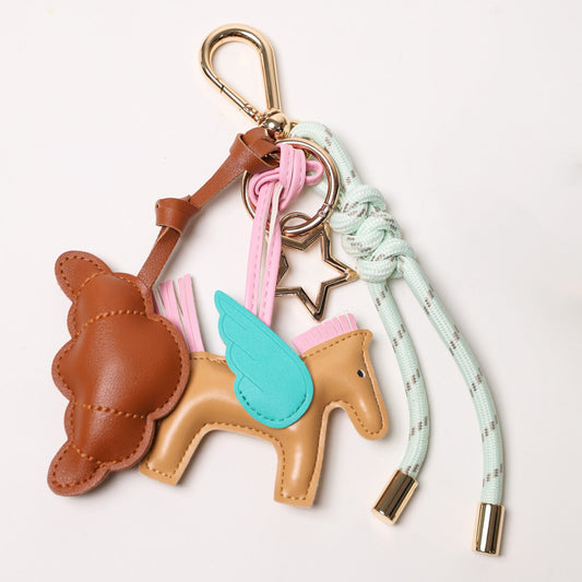 KEY CHAIN MINTY GREEN WITH CHARMS - BROWN CROISSANT AND BEIGE FLYING HORSE
