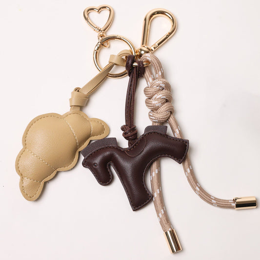 KEY CHAIN TAUPE WITH CHARMS - BEIGE CROISSANT AND ESPRESSO HORSE