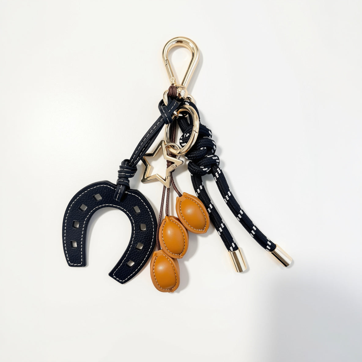 KEY CHAIN BLACK WITH CHARMS - BLACK HORSESHOE AND BROWN COFFEE BEANS