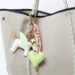 KEY CHAIN BARBIE WITH CHARMS - GREEN HEART AND WHITE FLYING HORSE