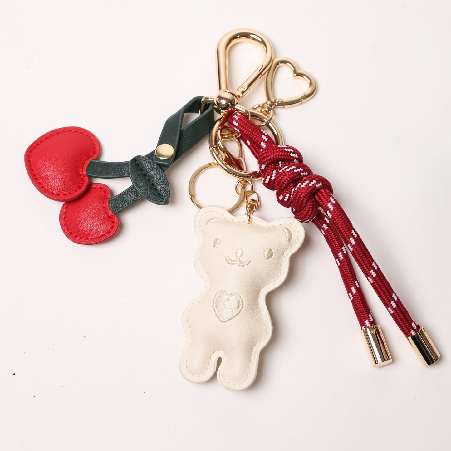 KEY CHAIN BURGUNDY WITH CHARMS - WHITE TEDDY AND RED HEART CHERRIES