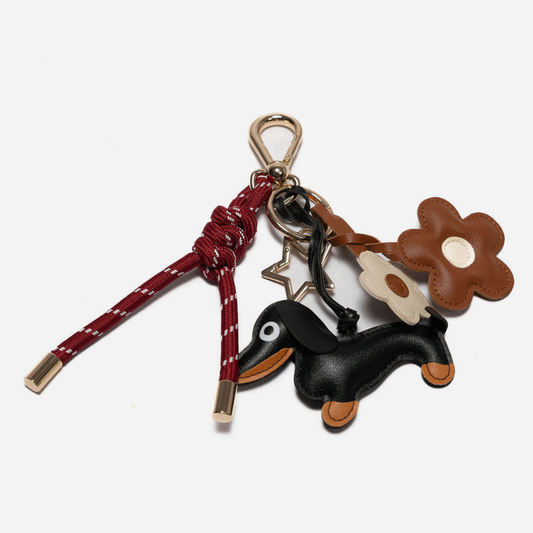 KEY CHAIN BURGUNDY WITH CHARMS - BLACK DOG AND BROWN DAISIES