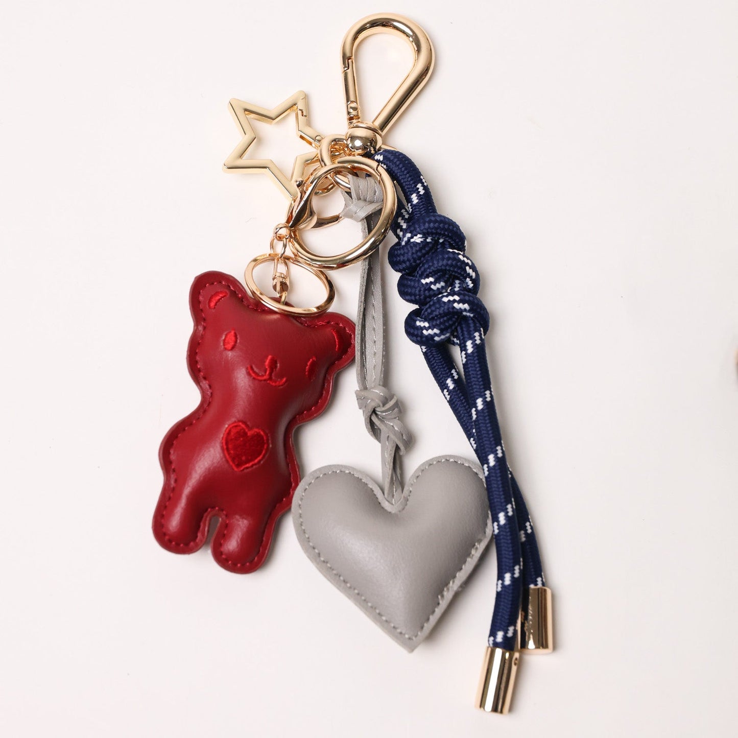 KEY CHAIN DEEP BLUE WITH CHARMS - GREY HEART AND RED TEDDY