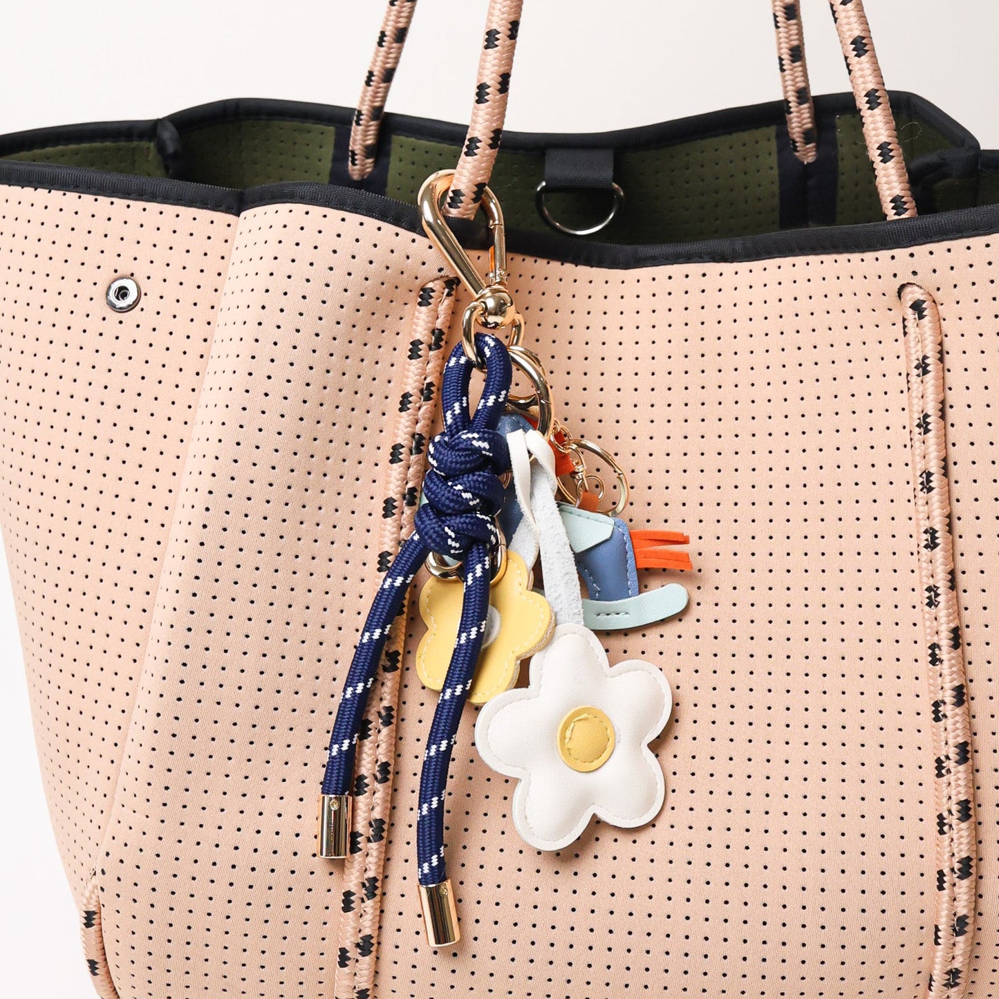 KEY CHAIN DEEP BLUE WITH CHARMS - YELLOW DAISIES AND BLUE ROCKING HORSE