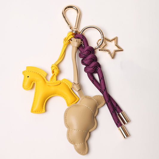 KEY CHAIN EGGPLANT WITH CHARMS - BEIGE CROISSANT AND YELLOW HORSE