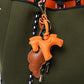 KEY CHAIN EMERALD WITH CHARMS - BROWN CROISSANT AND ORANGE HORSE