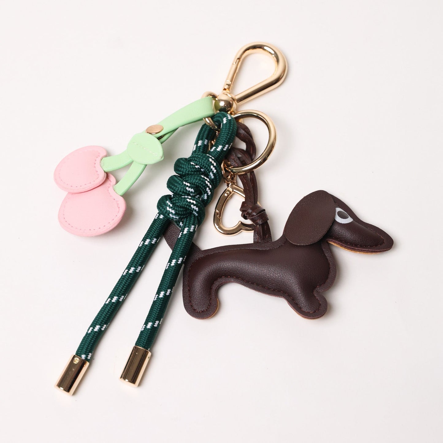 KEY CHAIN EMERALD WITH CHARMS - ESPRESSO DOG AND PINK HEART CHERRIES
