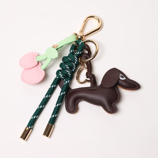 KEY CHAIN EMERALD WITH CHARMS - ESPRESSO DOG AND PINK HEART CHERRIES