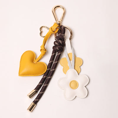 KEY CHAIN ESPRESSO WITH CHARMS - YELLOW HEART AND BROWN DAISIES