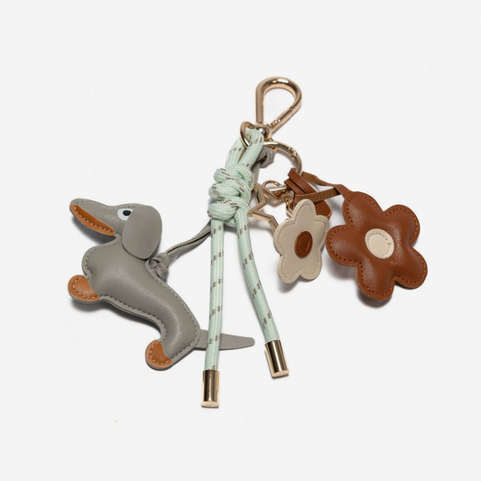 KEY CHAIN MINTY GREEN WITH CHARMS - GREY DOG AND BROWN DAISIES