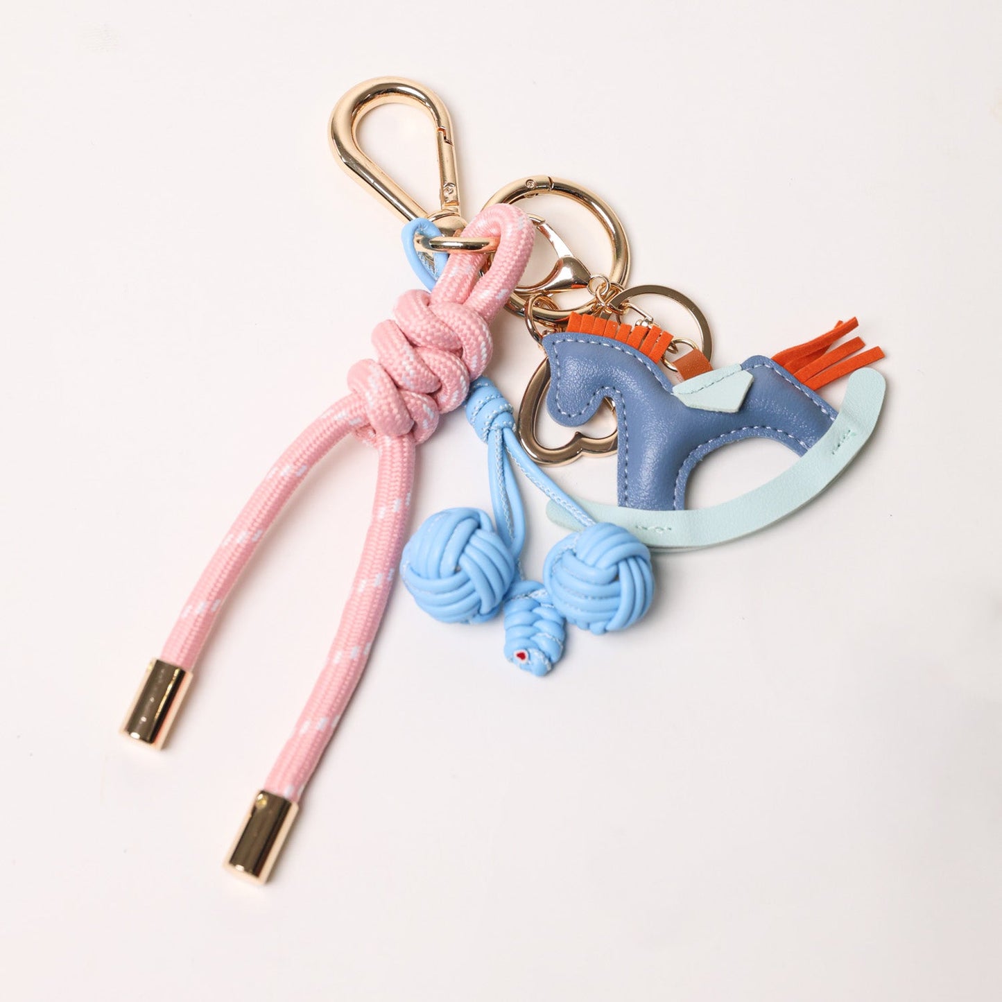 KEY CHAIN PRETTY IN PINK WITH CHARMS - BLUE CHERRIES AND BLUE ROCKING HORSE