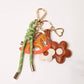 KEY CHAIN SAFARI GREEN WITH CHARMS - BROWN ROCKING HORSE AND BROWN DAISIES