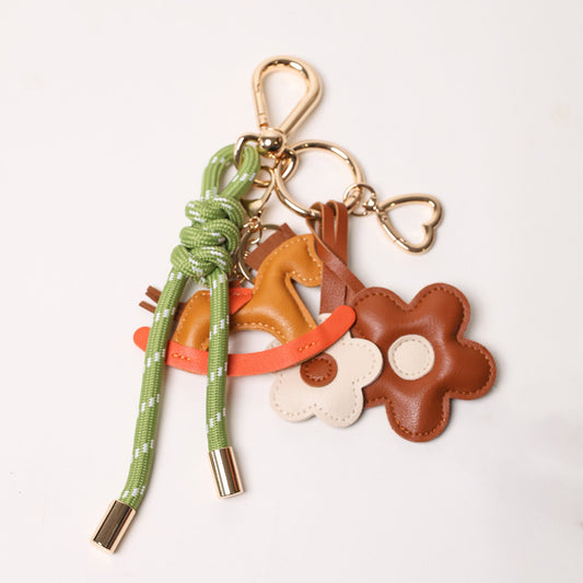 KEY CHAIN SAFARI GREEN WITH CHARMS - BROWN ROCKING HORSE AND BROWN DAISIES