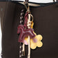 KEY CHAIN TAN WITH CHARMS - BURGUNDY HORSE AND YELLOW/PINK DAISIES