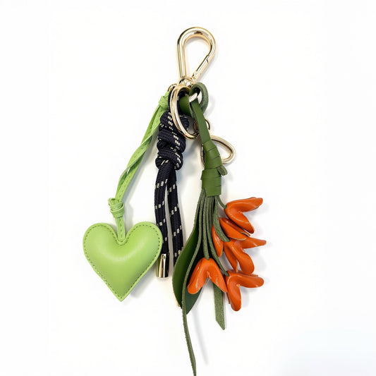 KEY CHAIN BLACK WITH CHARMS - GREEN HEART AND ORANGE TULIP