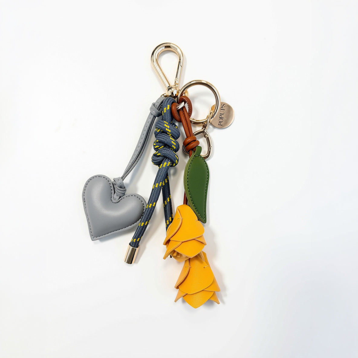 KEY CHAIN GRAPHITE WITH CHARMS - GREY HEART AND YELLOW ROSES
