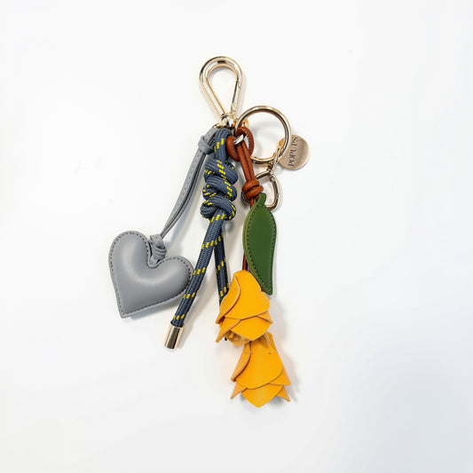 KEY CHAIN GRAPHITE WITH CHARMS - GREY HEART AND YELLOW ROSES