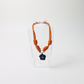 POP UPS X HANNAH B BOAT ROPE BURNT ORANGE NECKLACE WITH BLUE HIBISCUS