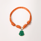 POP UPS X HANNAH B BOAT ROPE BURNT ORANGE NECKLACE WITH GREEN BUDDHA