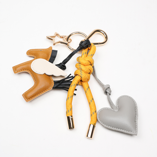 KEY CHAIN MUSTARD WITH CHARMS - BROWN FLYING HORSE AND GREY HEART