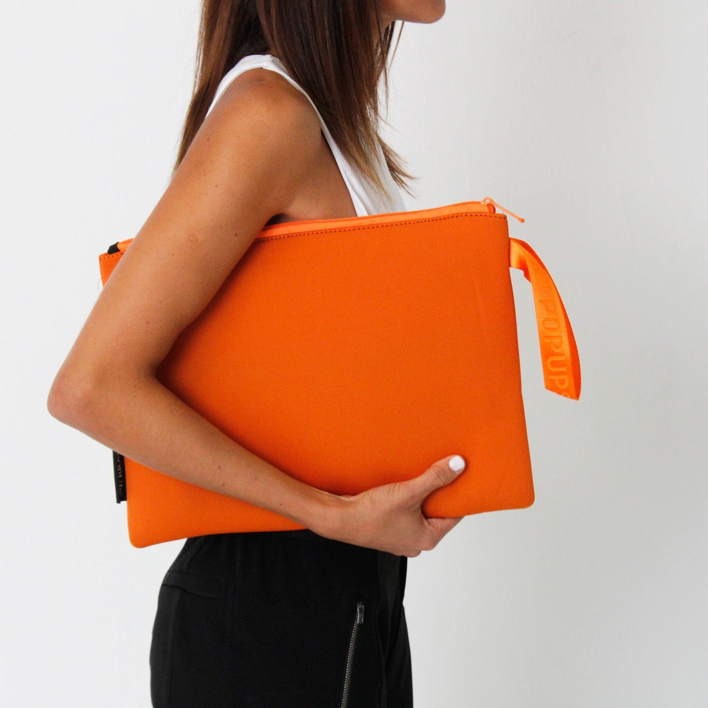 OVERSIZED WRISTLET POUCH BURNT ORANGE