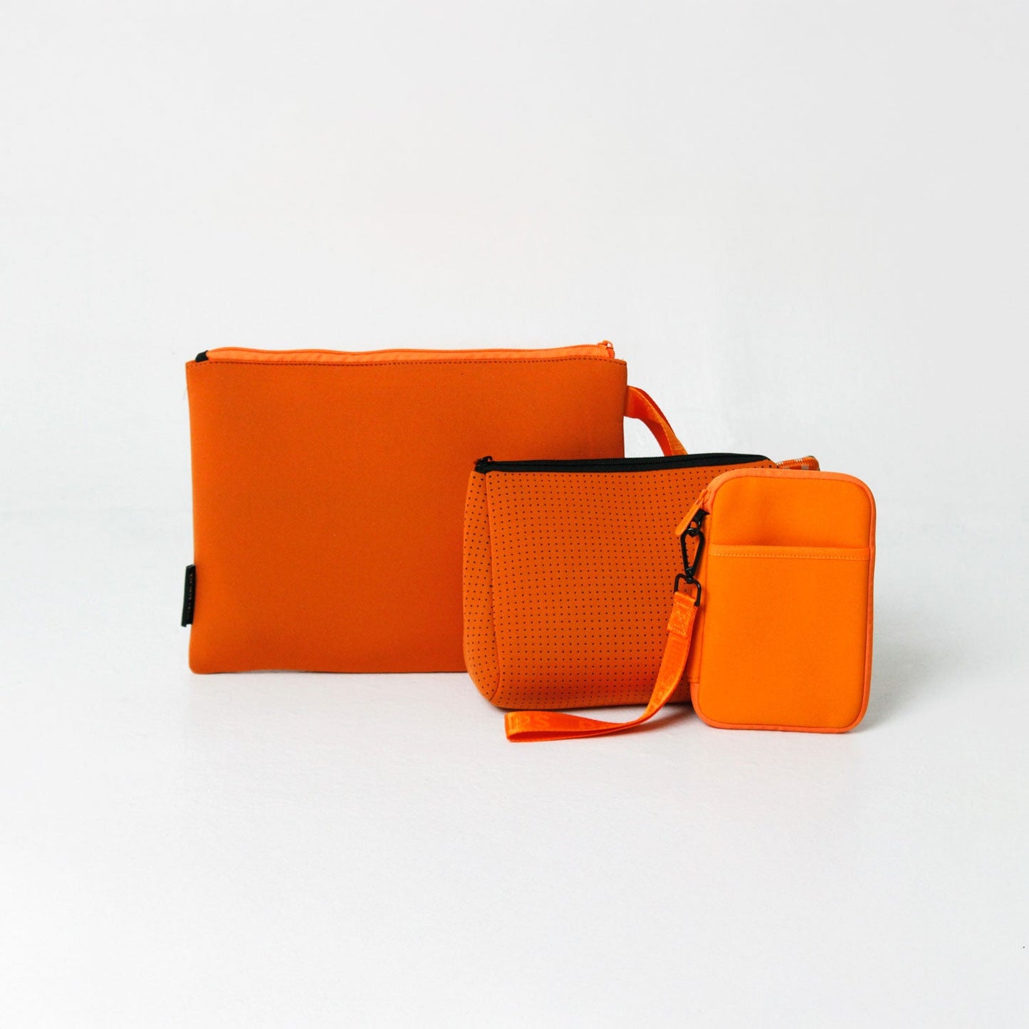 BURN ORANGE SET: OVERSIZED WRISTLET POUCH + ESSENTIAL POUCH + PASSPORT WALLET